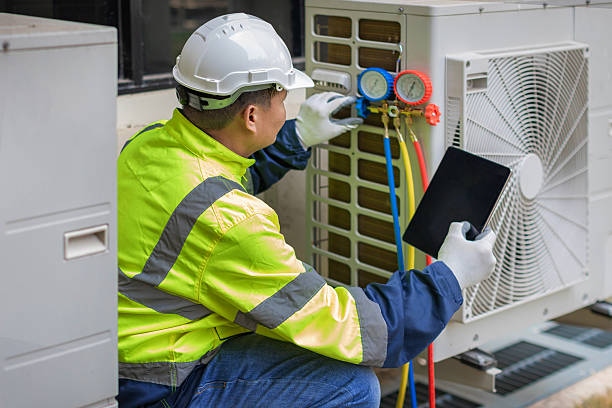 Professional Hvac technician working in Tomball, TX